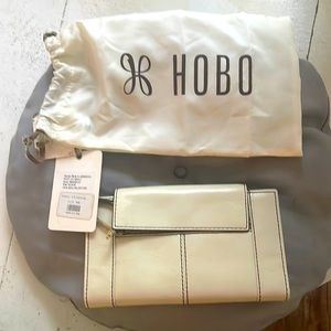 HOBO.new with retail tag $113 many card slots zippered front pocket